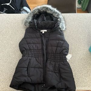 Brand new puffer vest with faux fur hood